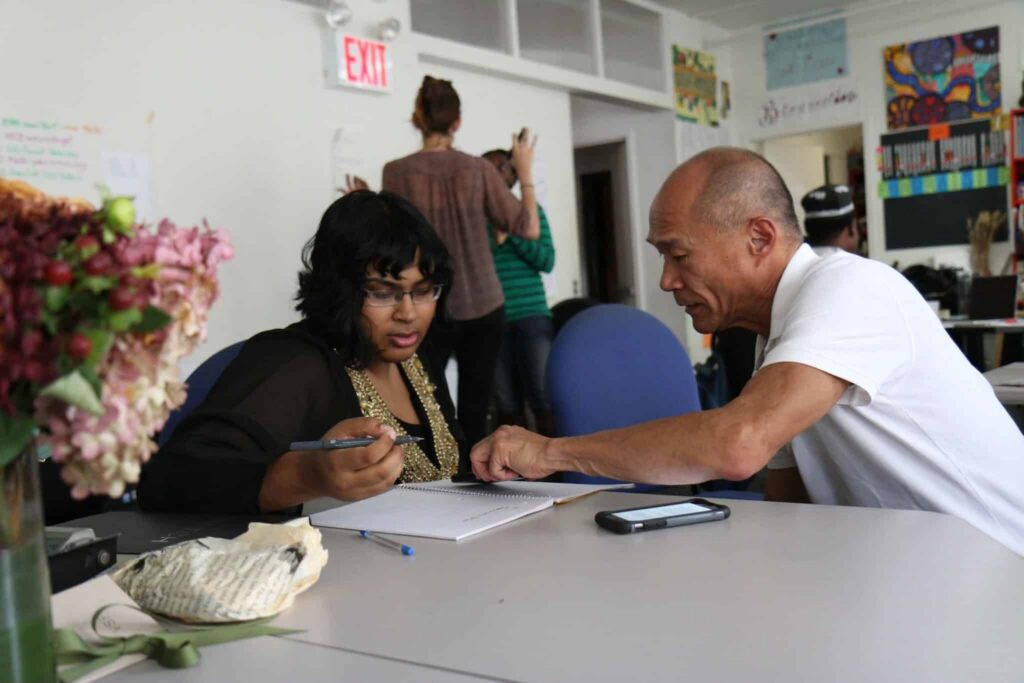 Two people, communicating